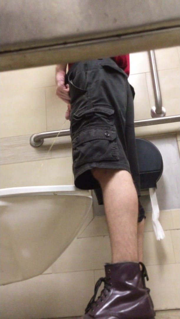 Grocery store worker pissing