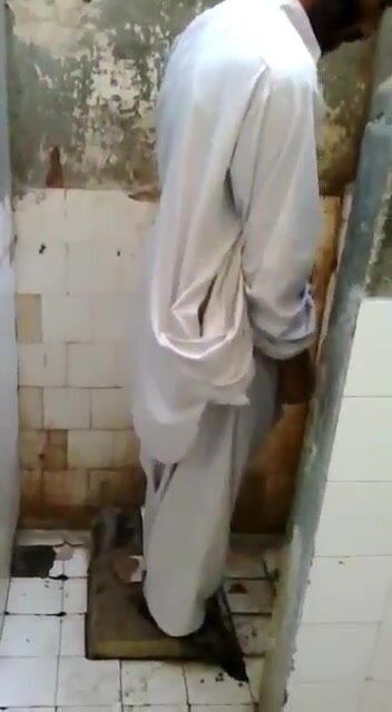 Pakistani caught public toilet