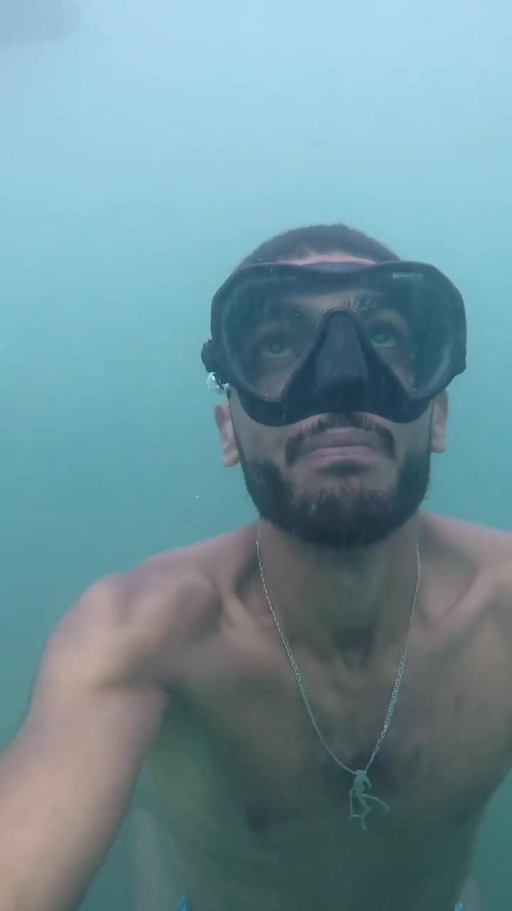 Barechest arab freediver underwater
