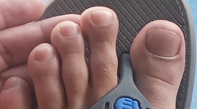 Male feet  flip flops