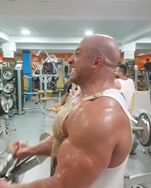 Massive bodybuilder sweating
