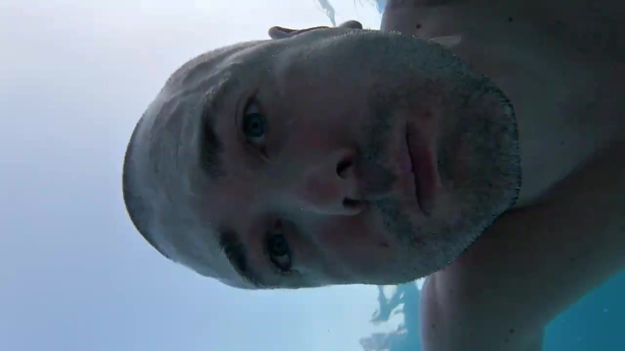 Swimming barefaced underwater in pool - video 7