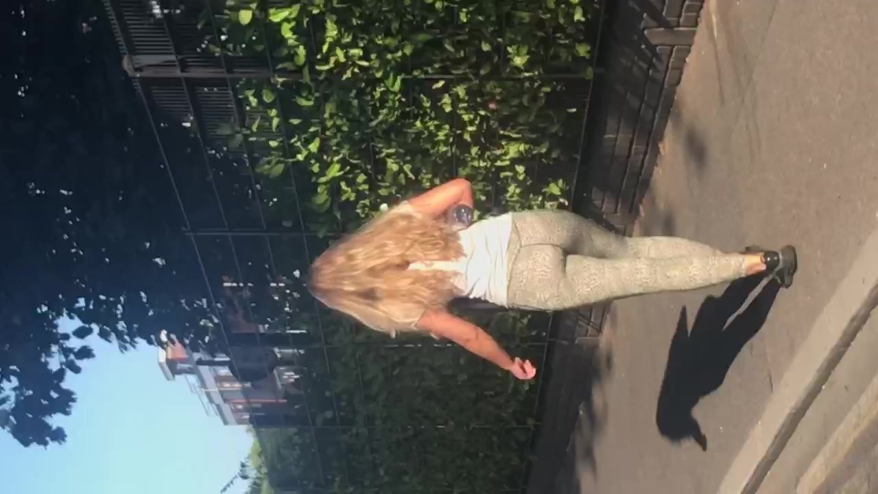 Hot blonde walking in leggings