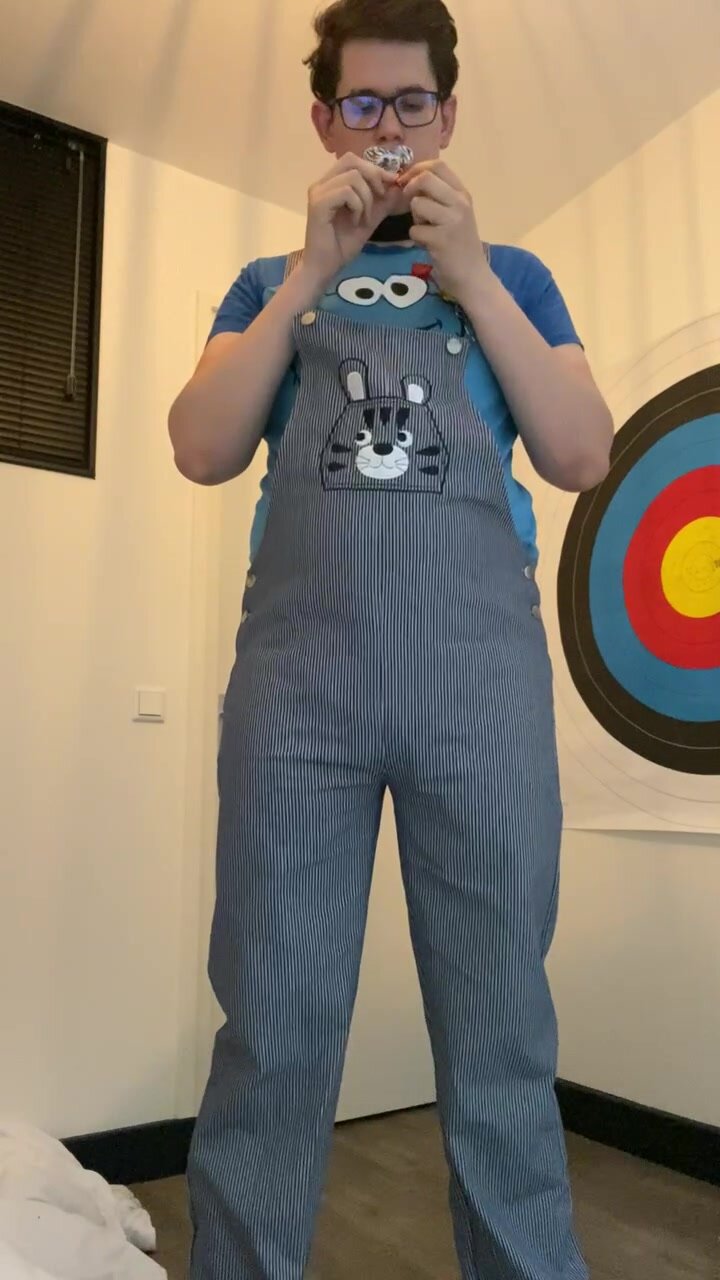Baby boy strips and shows of his diaper