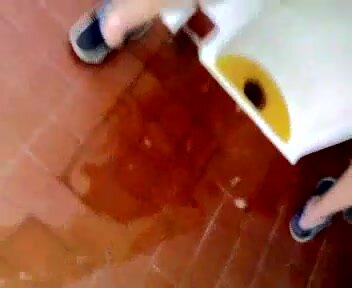 Pissing in a clogged urinal