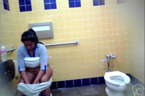 Latina using public restroom