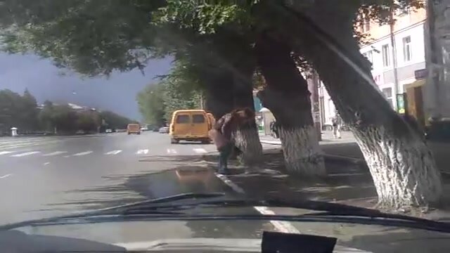 CRAZY GIRL PEES IN STREET