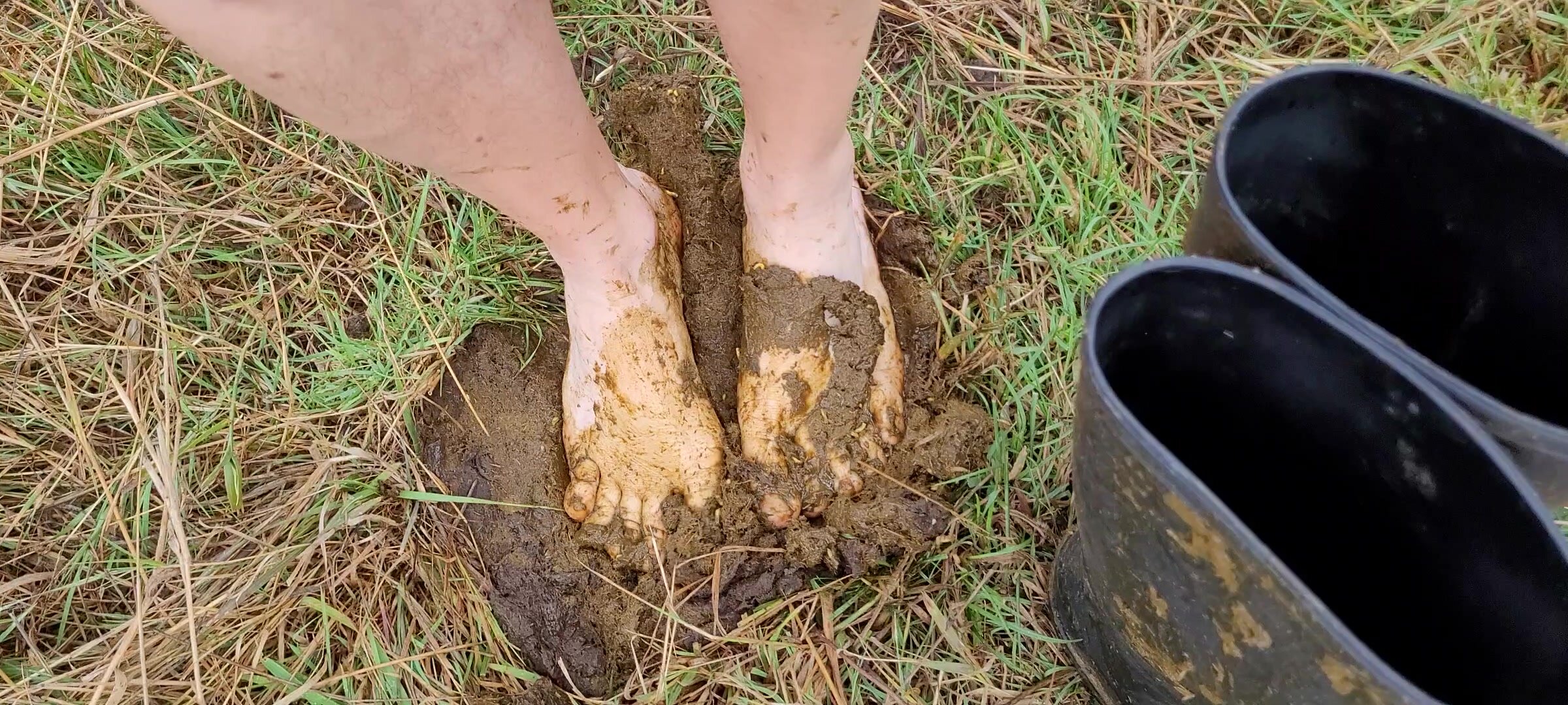 Boots and feet in cowshit 2