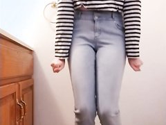 girl absolutly floods her jeans