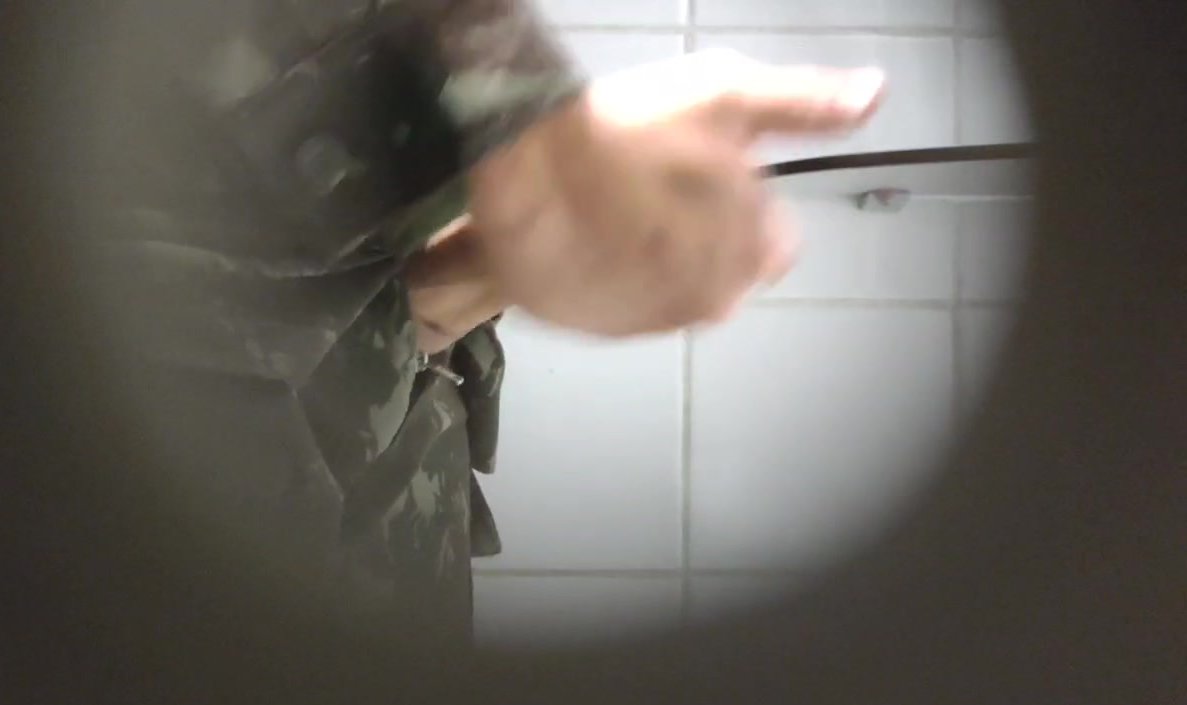 military man jerks off in the toilet and cums - video 2