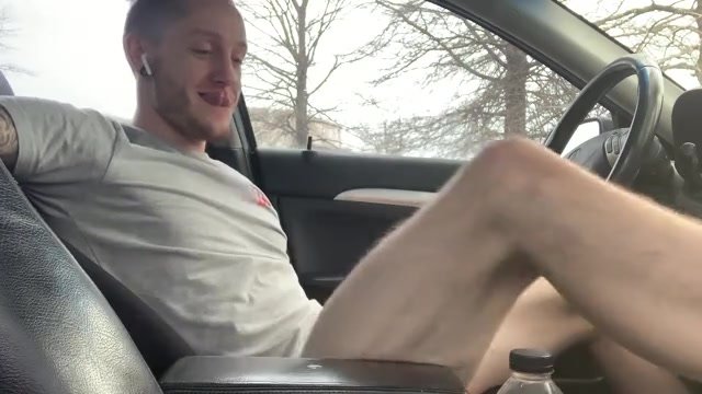 White boy wanking in car shoots a load of spunk