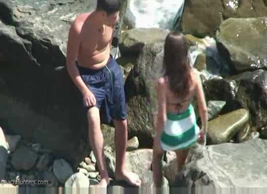 Horny couple fuck behind some rocks