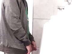 Daddy playing at the urinal