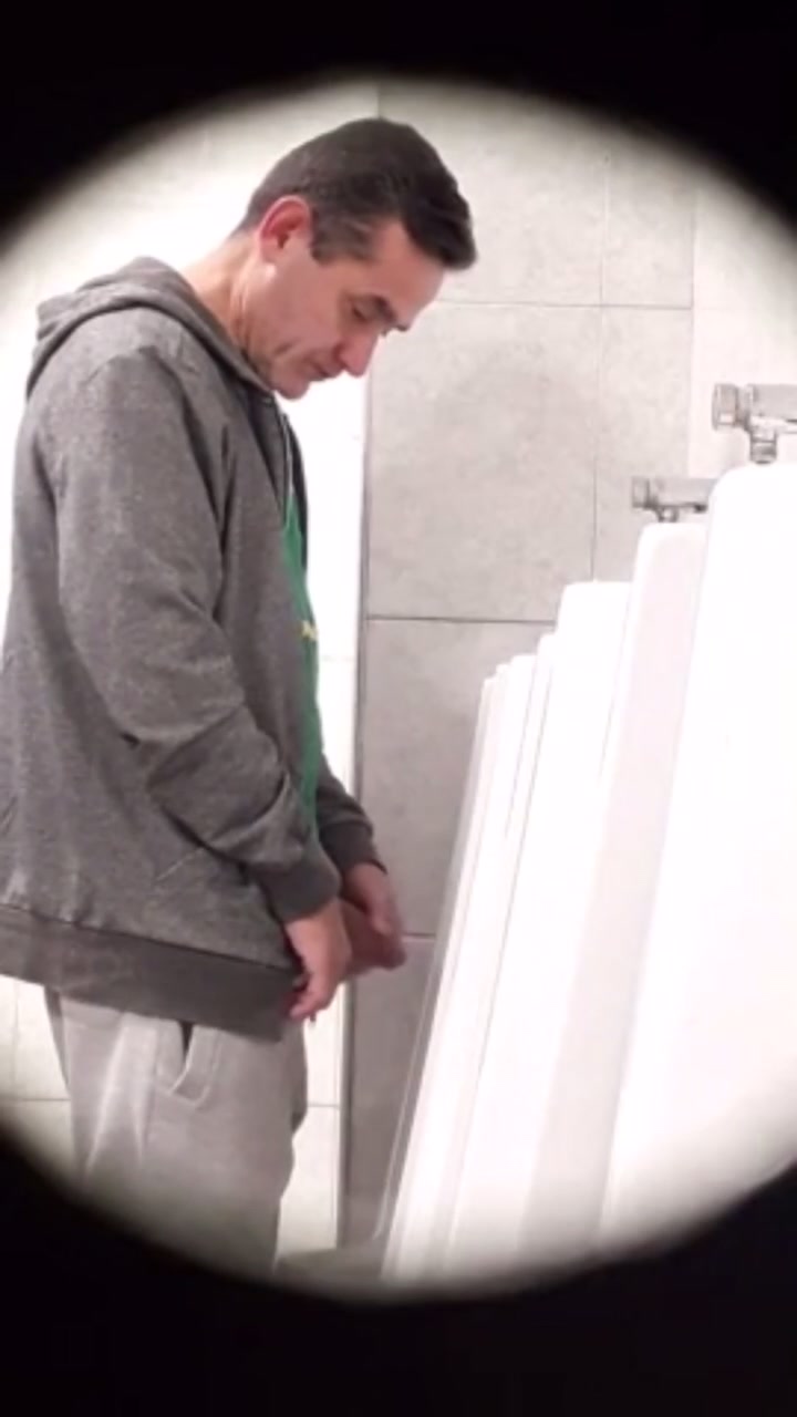 Daddy playing at the urinal