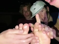 Having fun with his friend's feet and sock