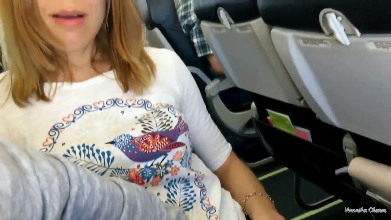 she masturbates her pussy in the cabin of the plane