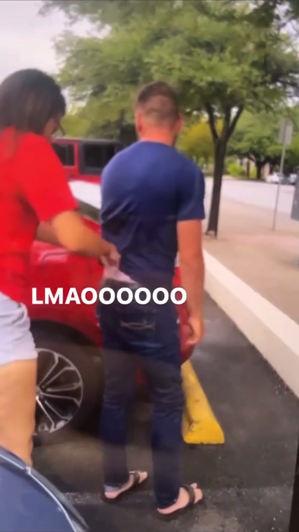 Girl gives guy thong wedgie