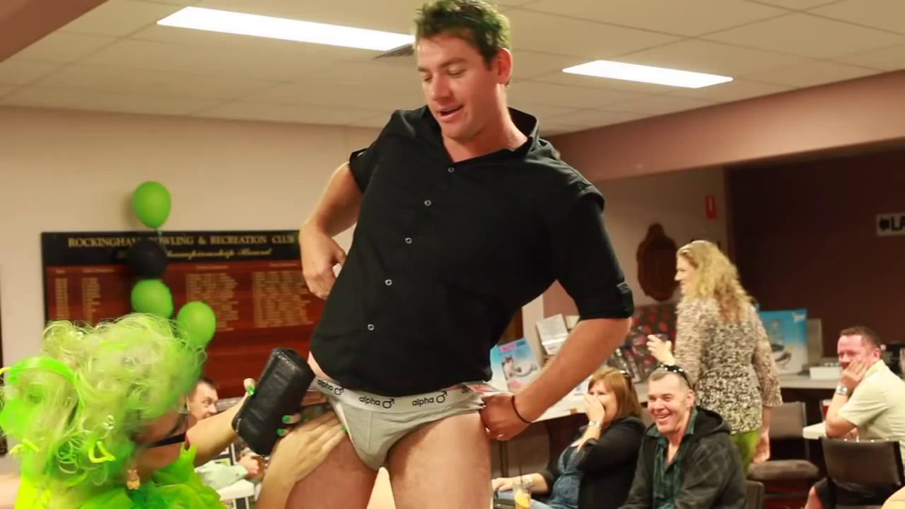 Beefy guy strips to undies for charity (no nudity)