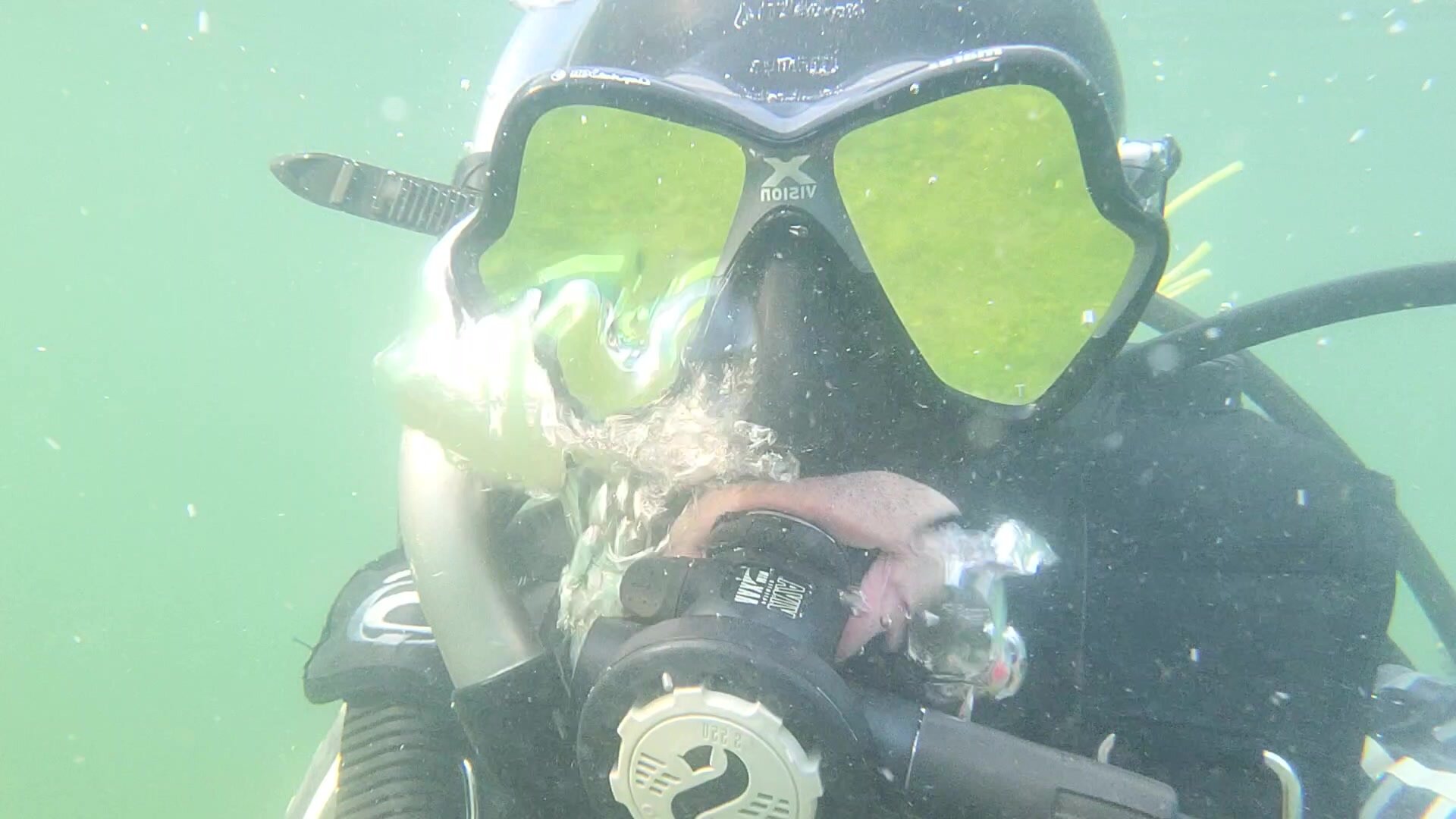Latex  Bi Scubadiver enjoy the morning diving