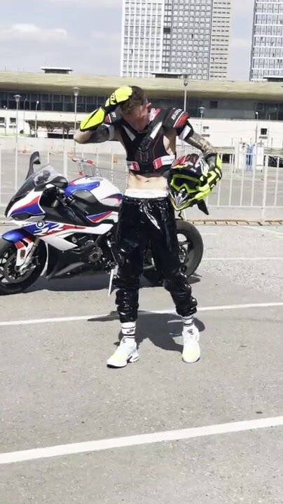 biker in shiny pants