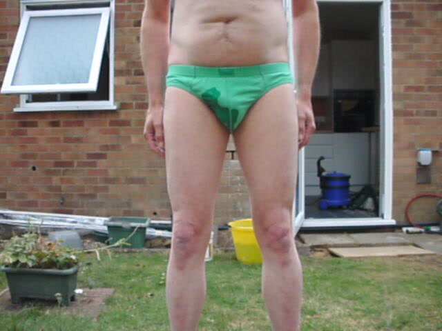 Outdoors piss in Green Briefs