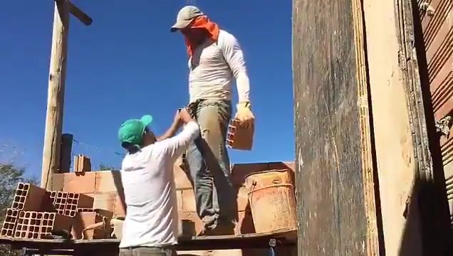 bricklayers having fun at work