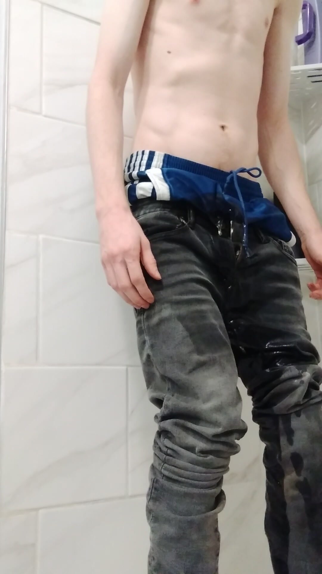 Pissing my shorts and jeans at the same time