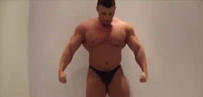 Big bodybuilder flexing