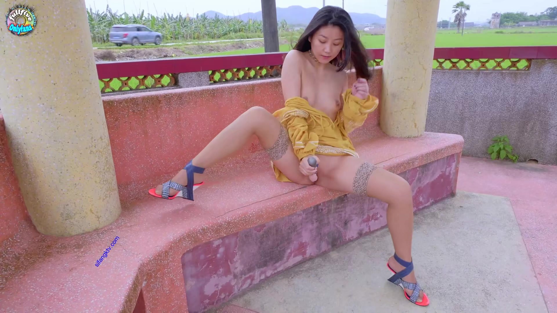 Asian woman masturbating and squirting outdoor