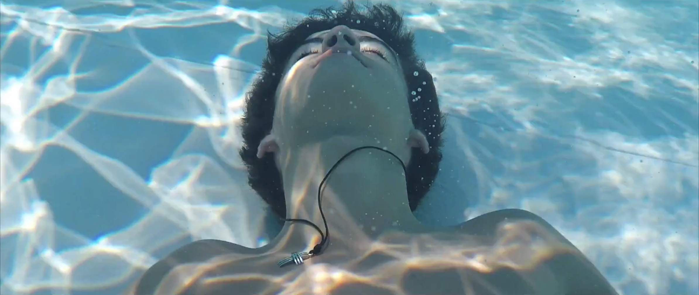 Model with beautiful hair underwater