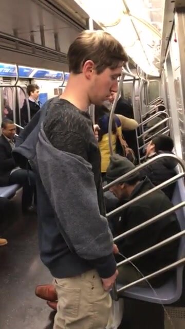 Drunk guy pisses on the subway