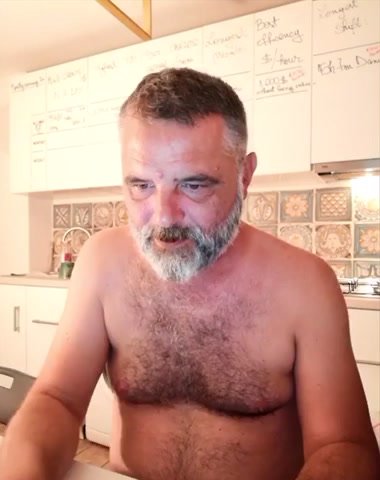 Hairy dad shows uncut cock