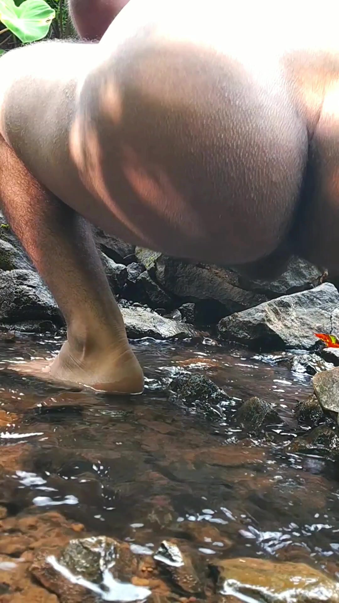 Indian style pooping and washing ass in the jungle