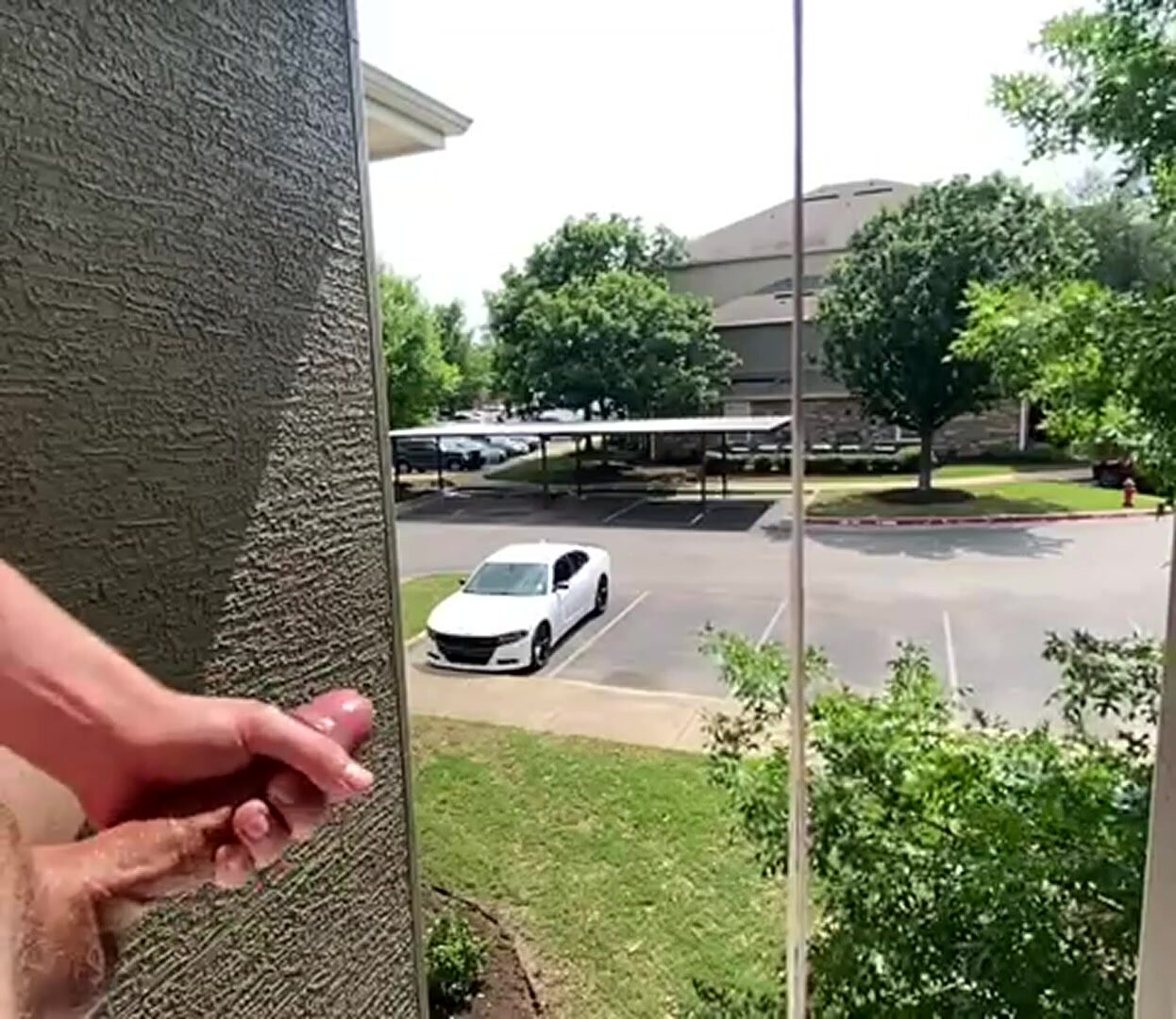 guy cums out of window in apartment complex