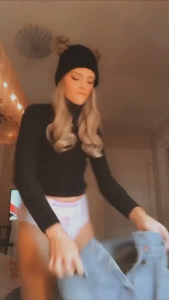 Hot diaper girl puts on jeans