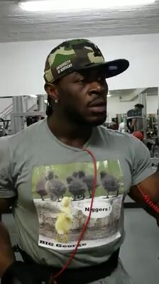 BLACK MAN IN GYM USES WHITEBOIS AS EXTRA WEIGHT