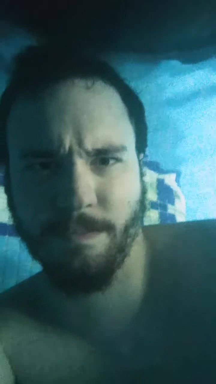 Barefaced bearded hottie breatholding underwater