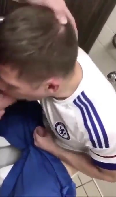 Soccer lad and pickup get off in stall