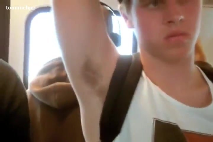 Blond guy's armpits fills the train with his sour musk