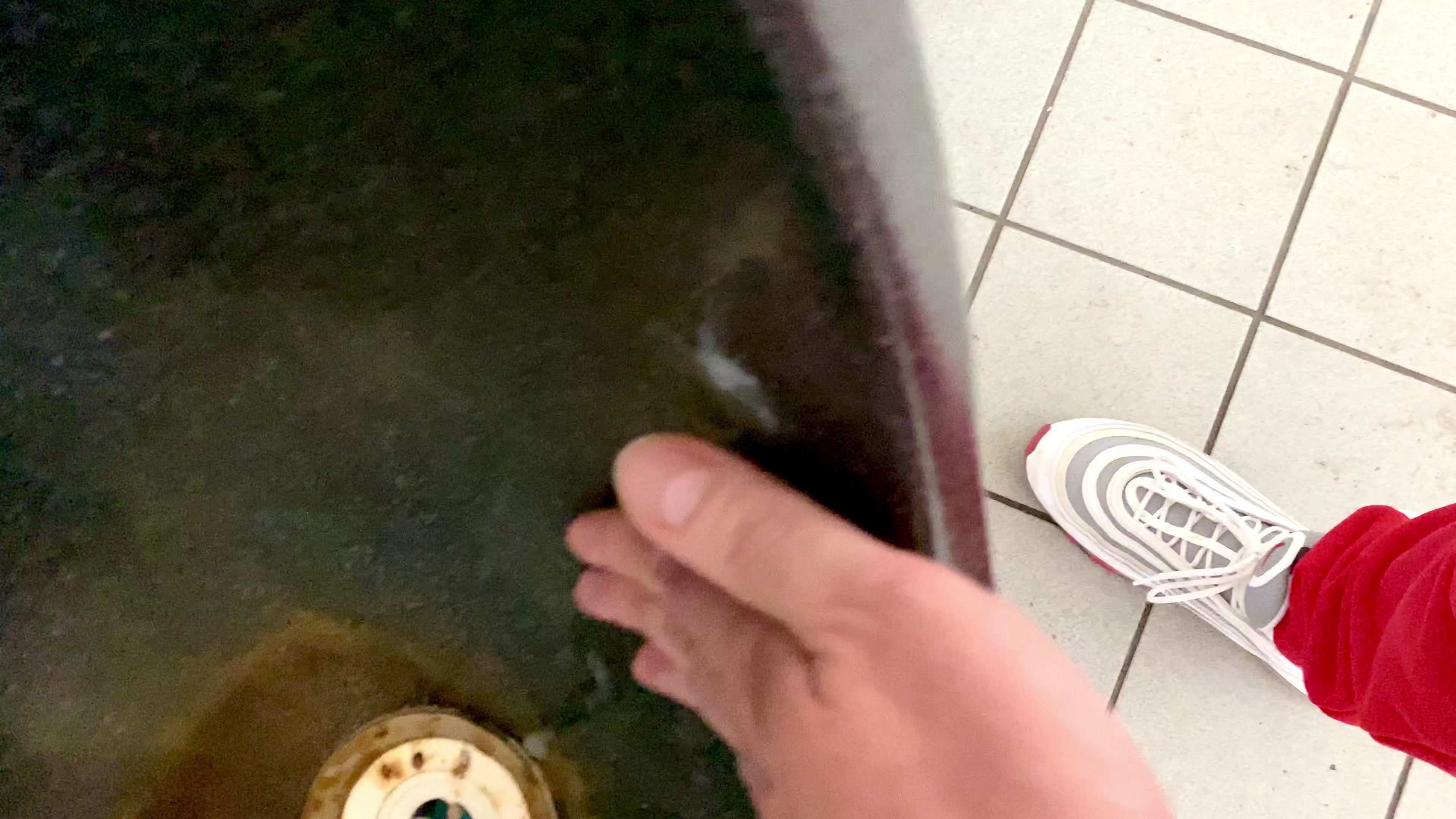 stranger's cum in a public urinal