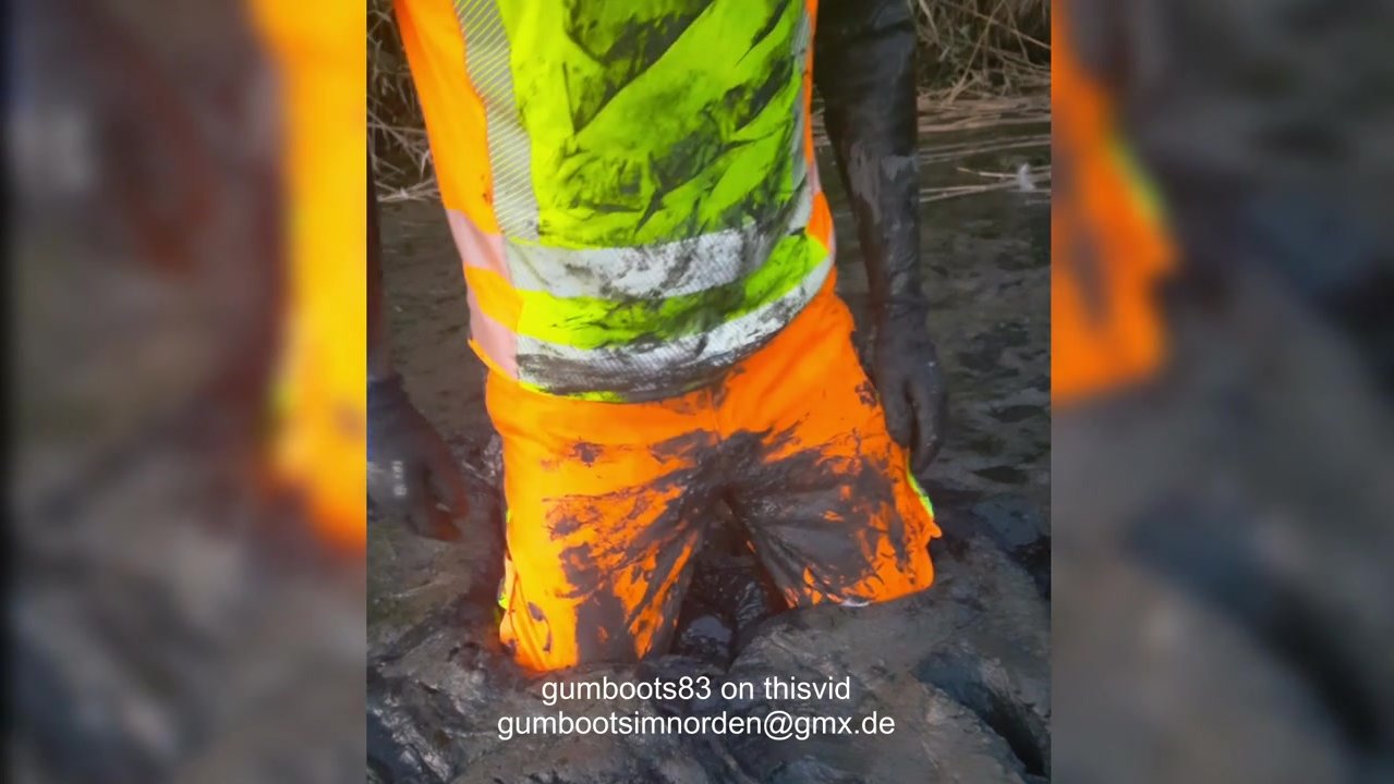 with hiviz and rubber in muddy river