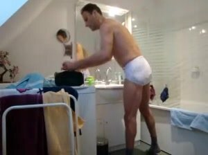 man wearing diaper in the bathroom