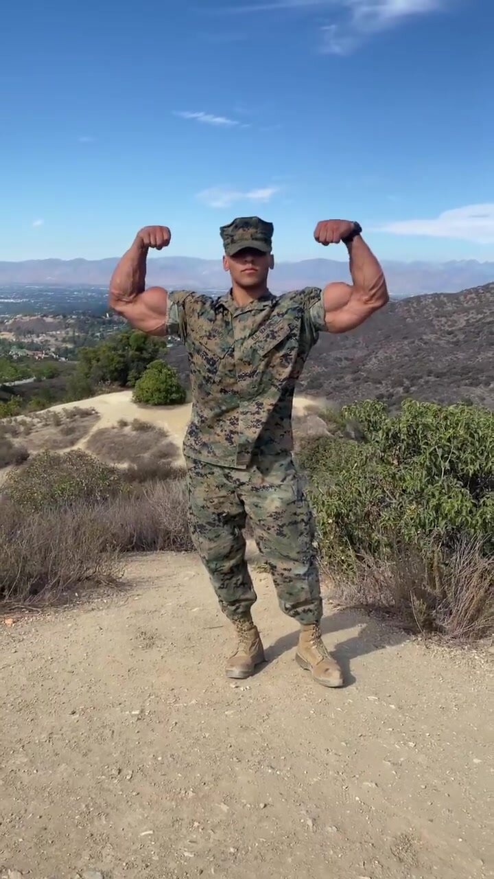 US marine flexes giant biceps