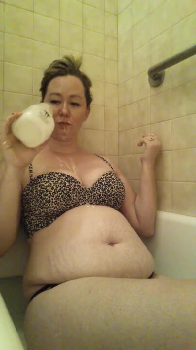 mature girl chugging a milk