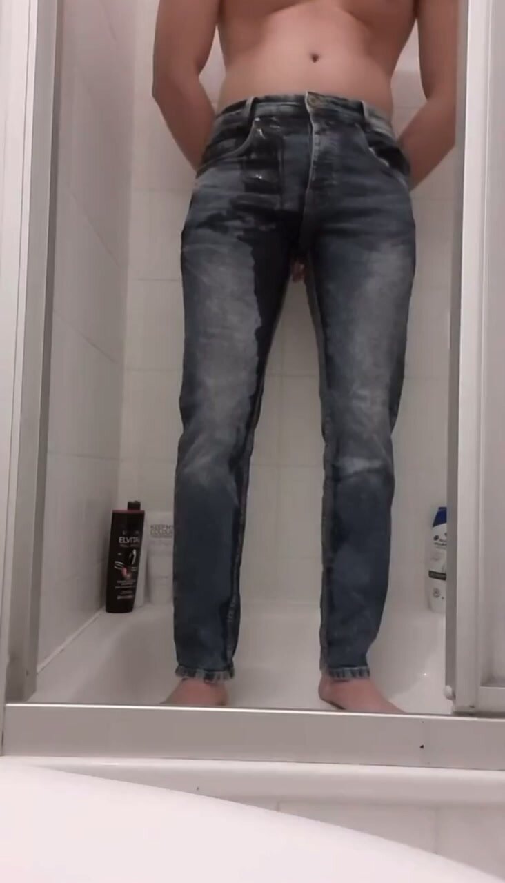 Hot guy bursting in worn jeans