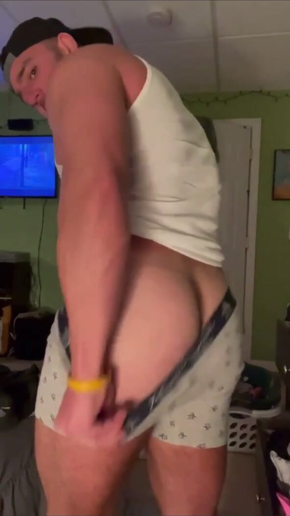 Straight guy mooning and smacks ass