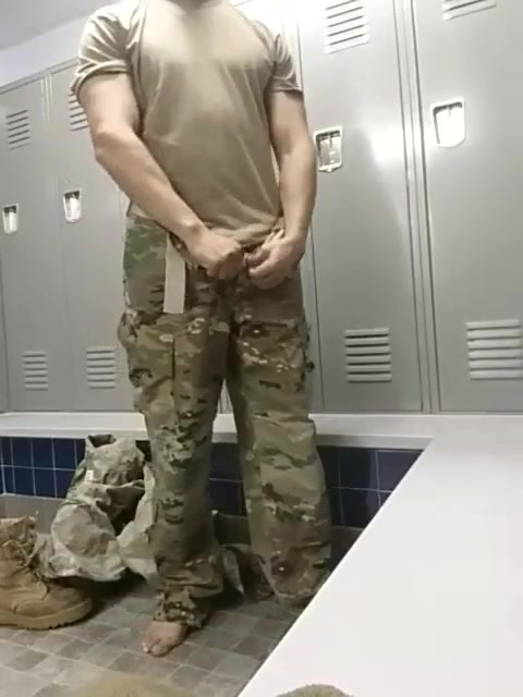 solider plays with cock in the locker room