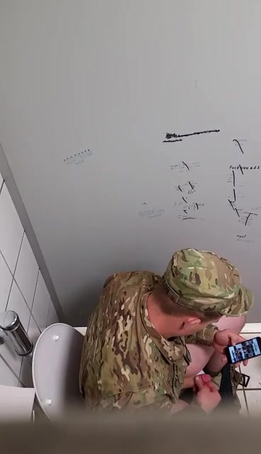 solider JF  in the bathroom