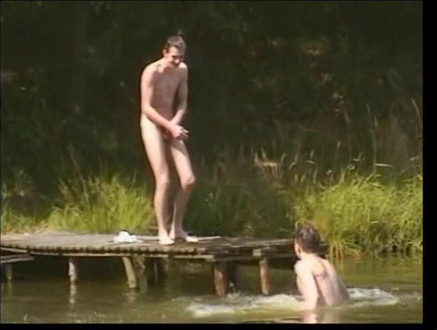 Two friends having a nude swim