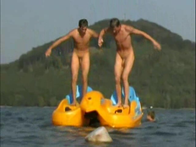 Nude twinks having fun in the lake